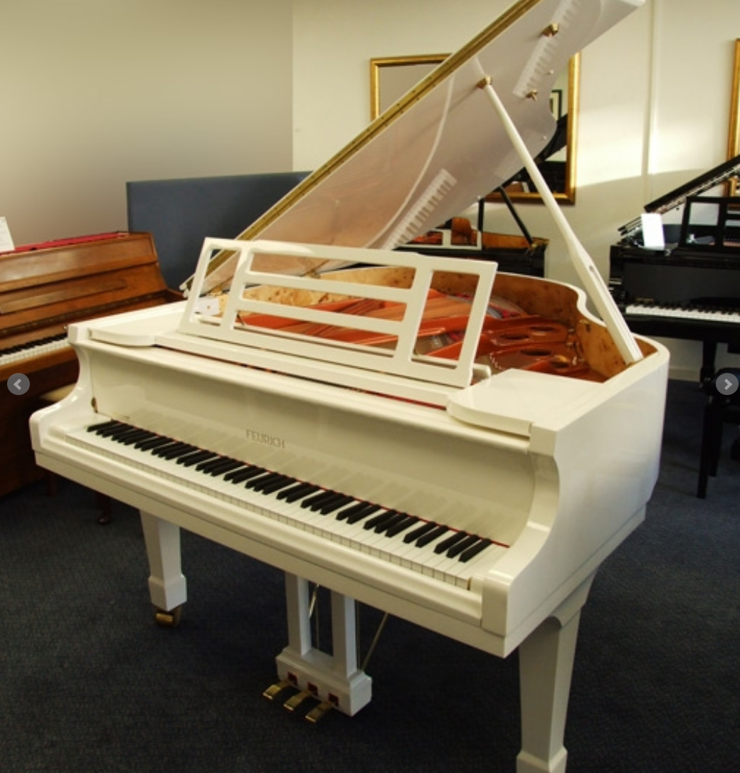 white feurich 161 grand piano